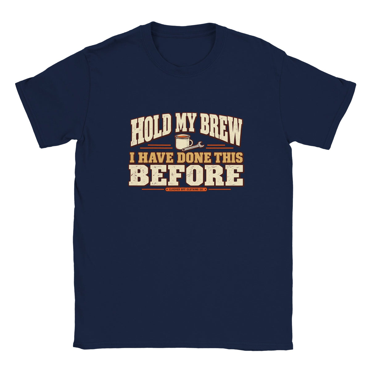Front of a navy T-shirt with ‘Hold My Brew, I Have Done This Before’ lettering, a mug and spanner graphic, and Clocked Off Clothing Co. branding.