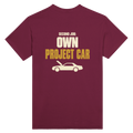 Maroon T-shirt back with “Second Job: Own Project Car” in cream and gold lettering above a car with its bonnet up
