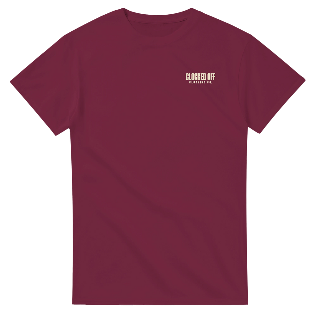 Front of a maroon T-shirt with a small Clocked Off Clothing Co. logo on the left chest