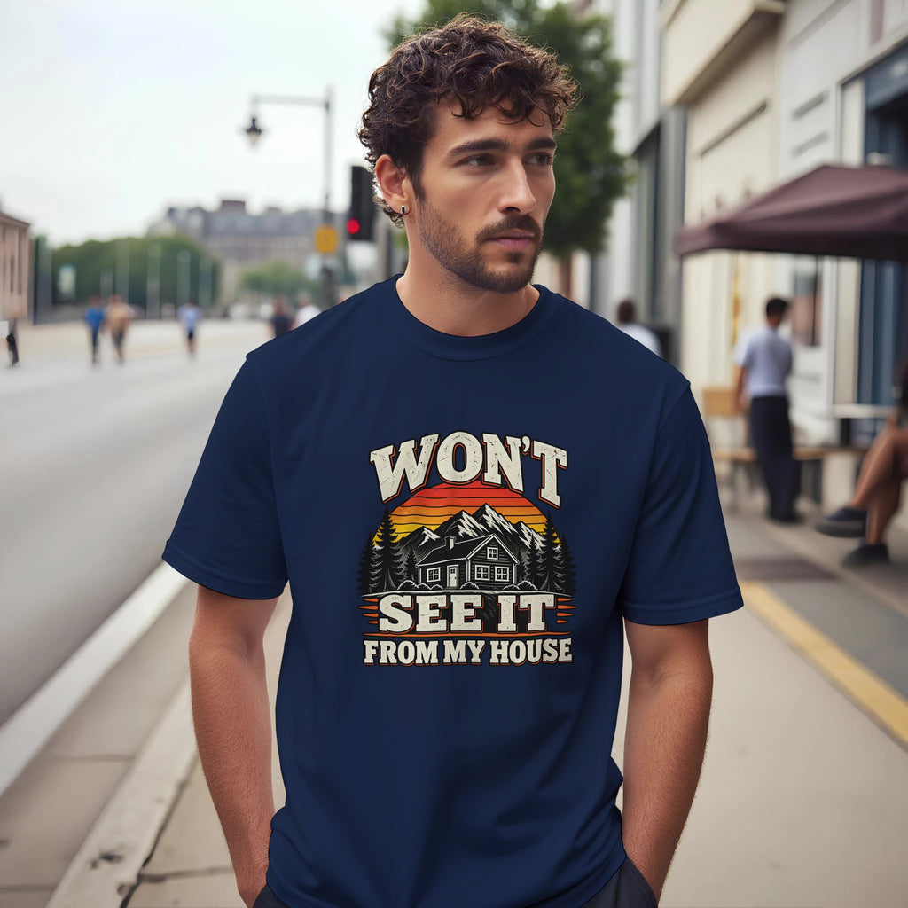 Man wearing the navy Won’t See It From My House T-shirt on a city street